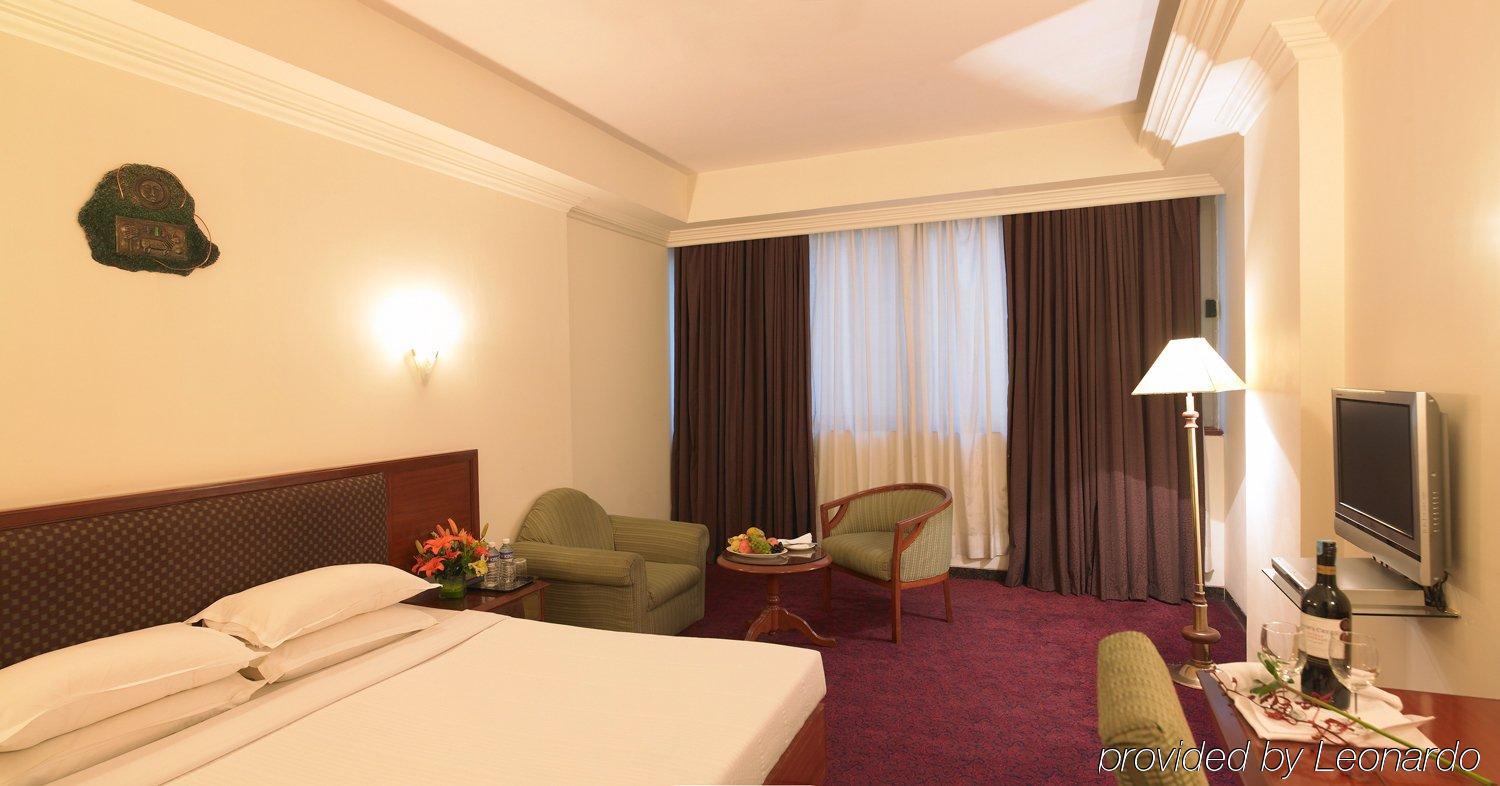 Hotel Museum Inn Bengaluru Szoba fotó